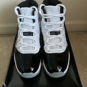 UA pair of Jordan 11 concords